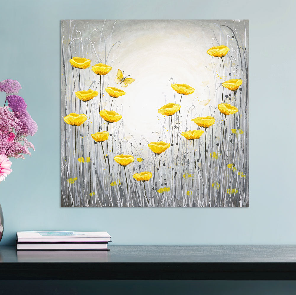 Grey and yellow art in blue room