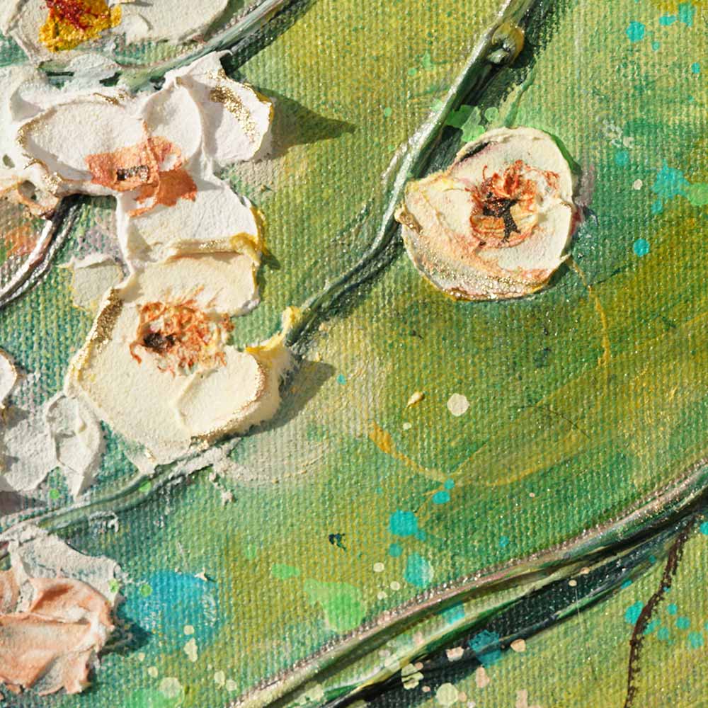 Close-up of a cherry blossom branch with touches of yellow