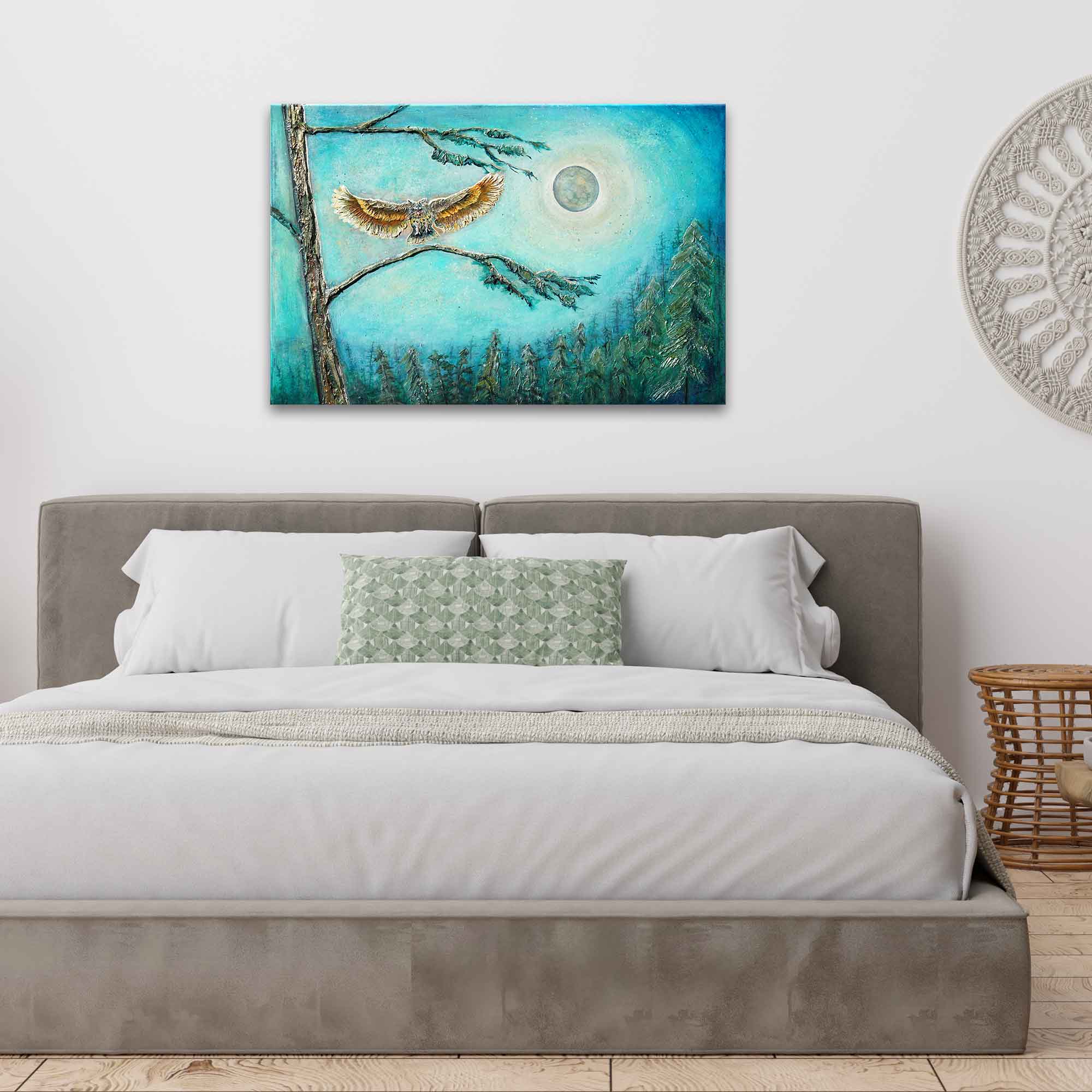 Bedroom with a painting of an eagle on a branch over a forest and moon.