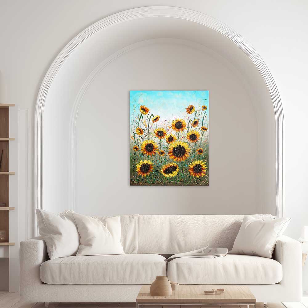 Sunflower art above cream sofa